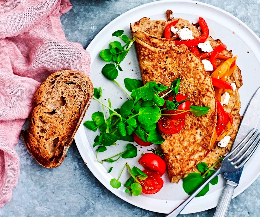 Lentil omelettes with braised capsicum & watercress