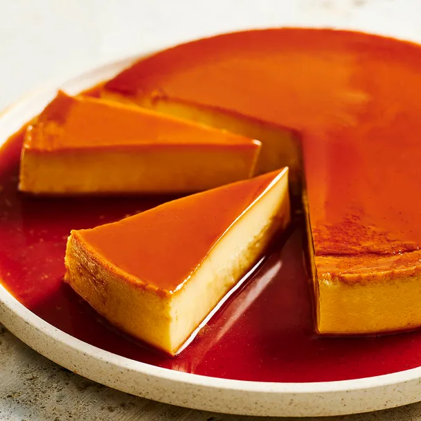 creme caramel on a plate swimming in caramel