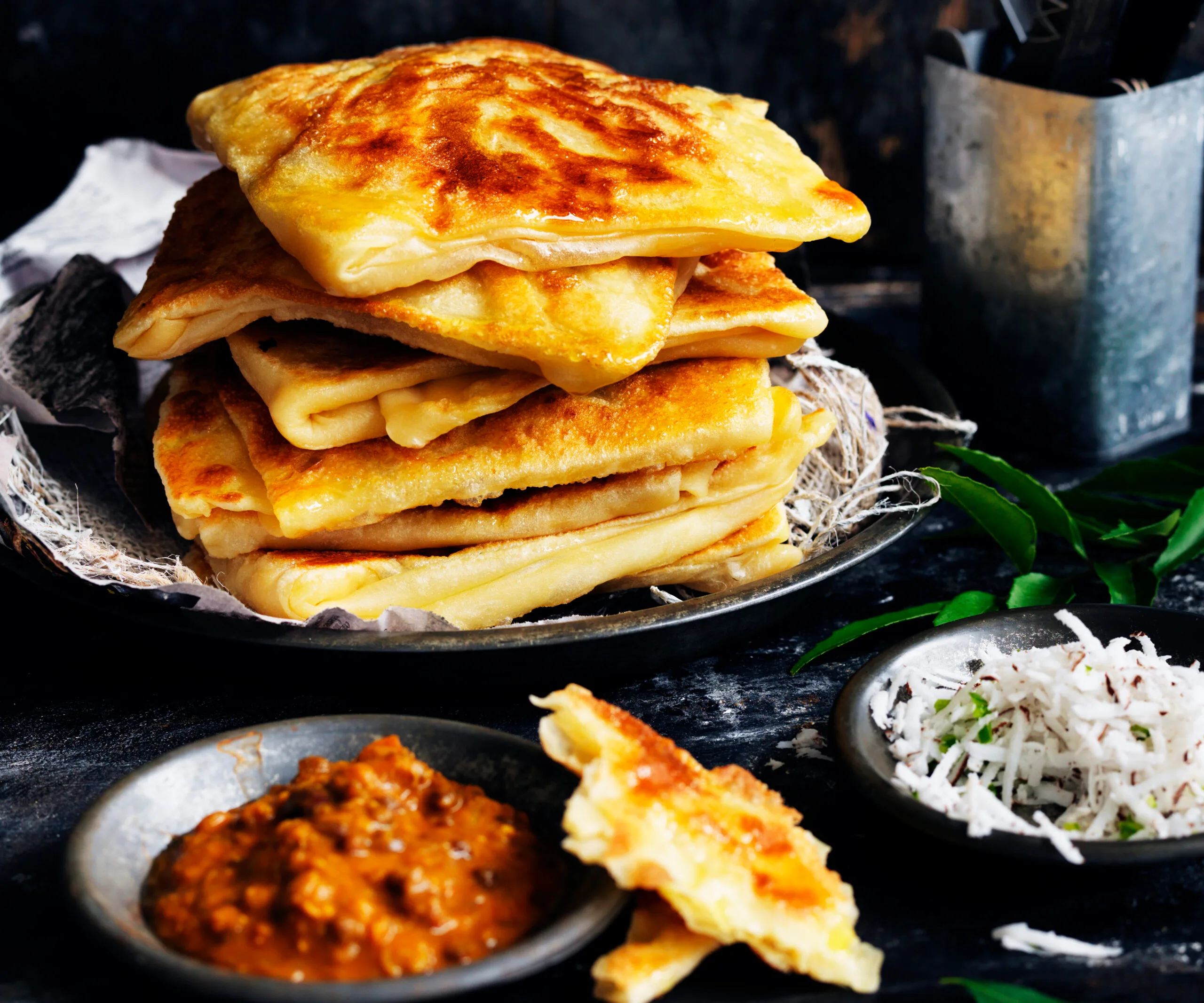 Roti canai flat breads on a plate