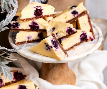 white chocolate & berry cheesecake slice