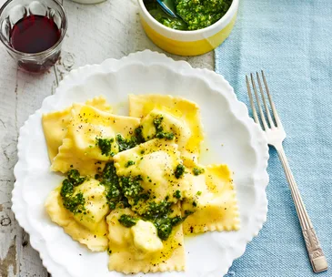 Herbed ricotta ravioli with walnut pesto sauce