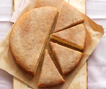 Cinnamon tea cake, half sliced into pieces