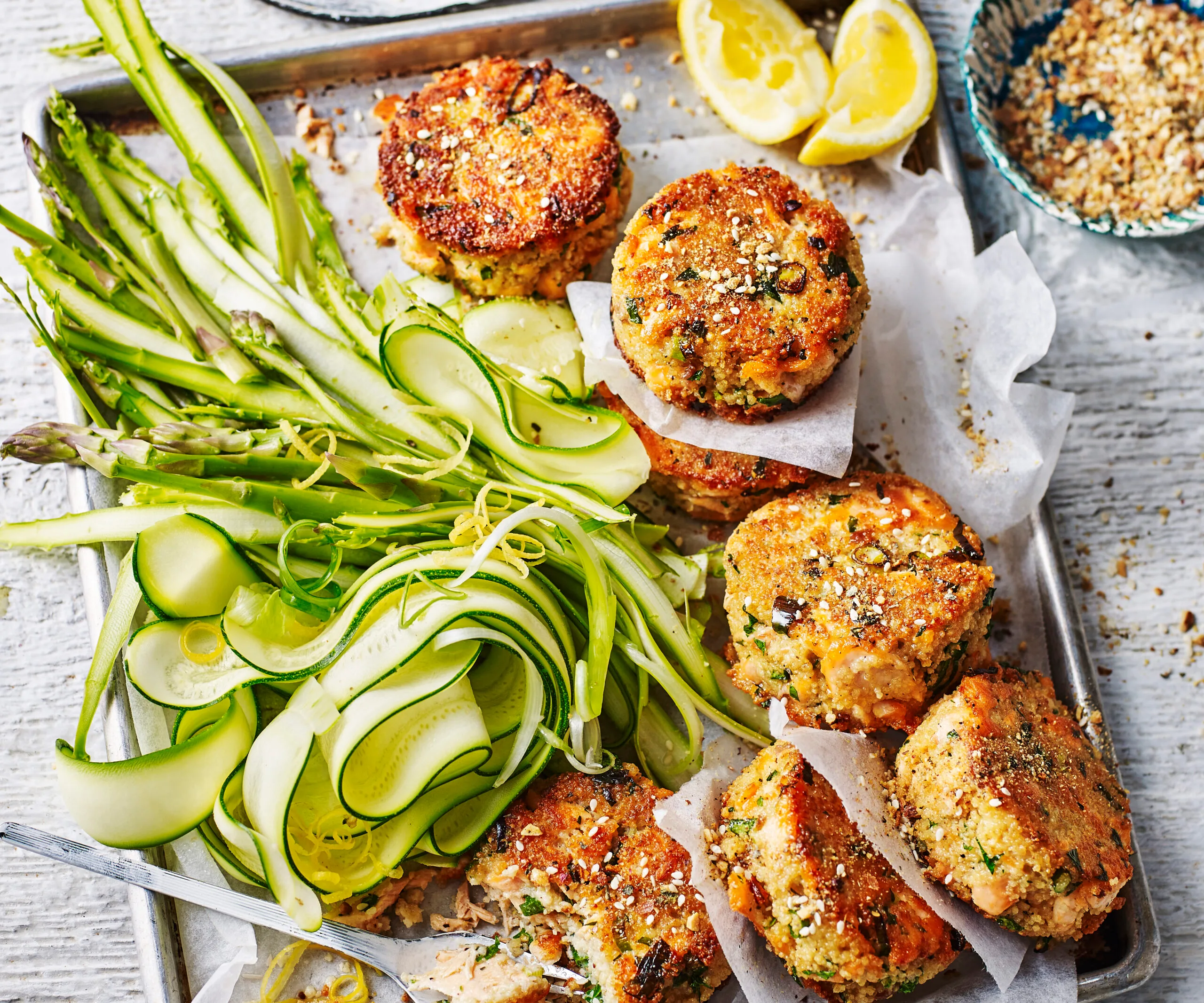 Dukkah salmon patties with zucchini and asparagus salad-image