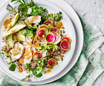 Poached chicken and quinoa salad with watercress