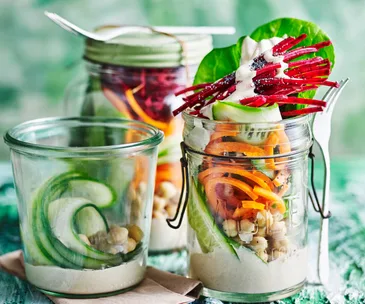 Rainbow salad with tahini cumin dressing