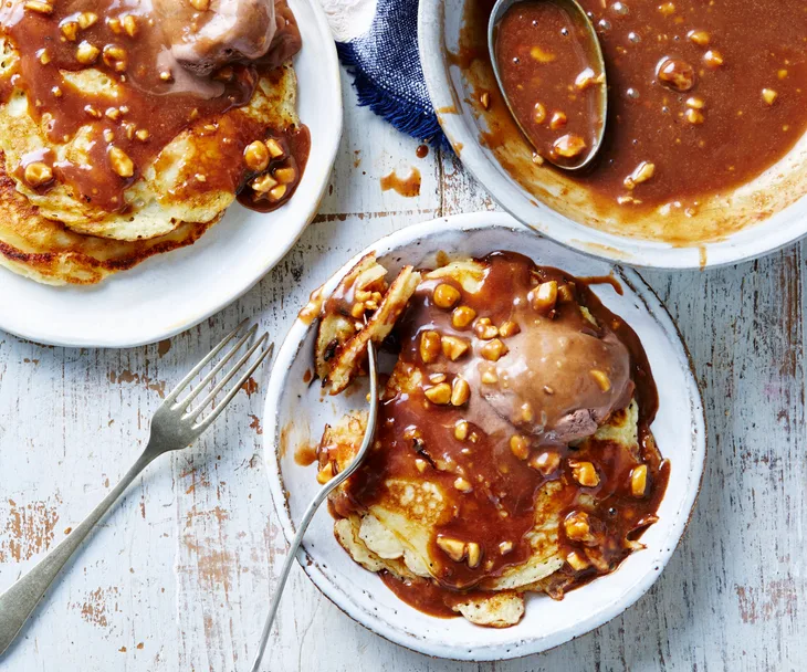 Banana pancakes with choc-peanut sauce