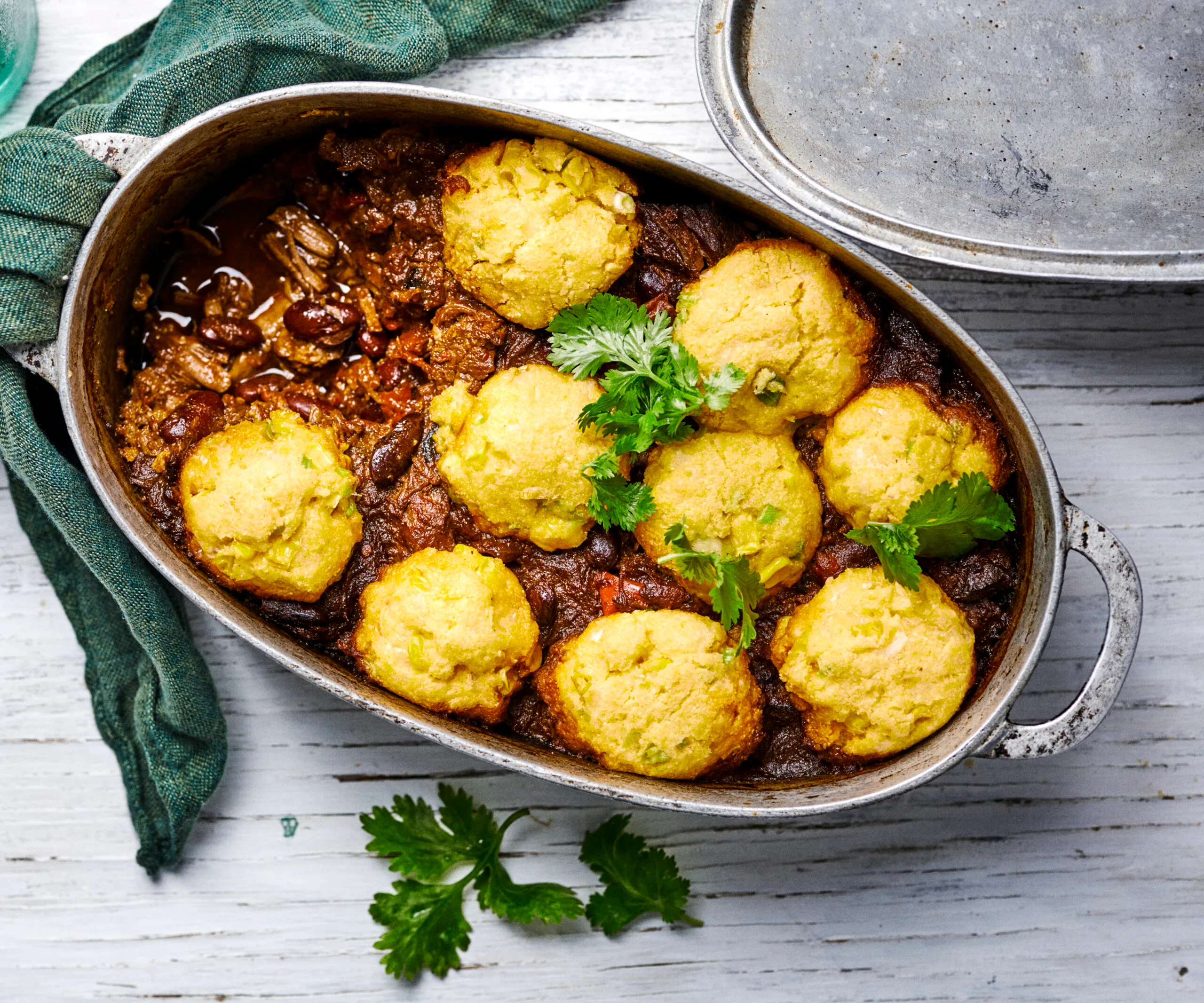 Chilli con carne with corn dumplings