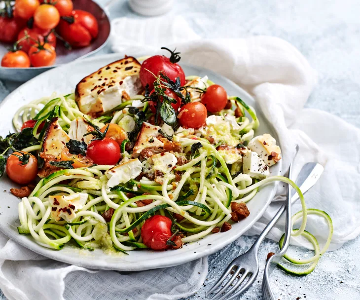 Zucchini spaghetti with baked fetta and chickpea croutons