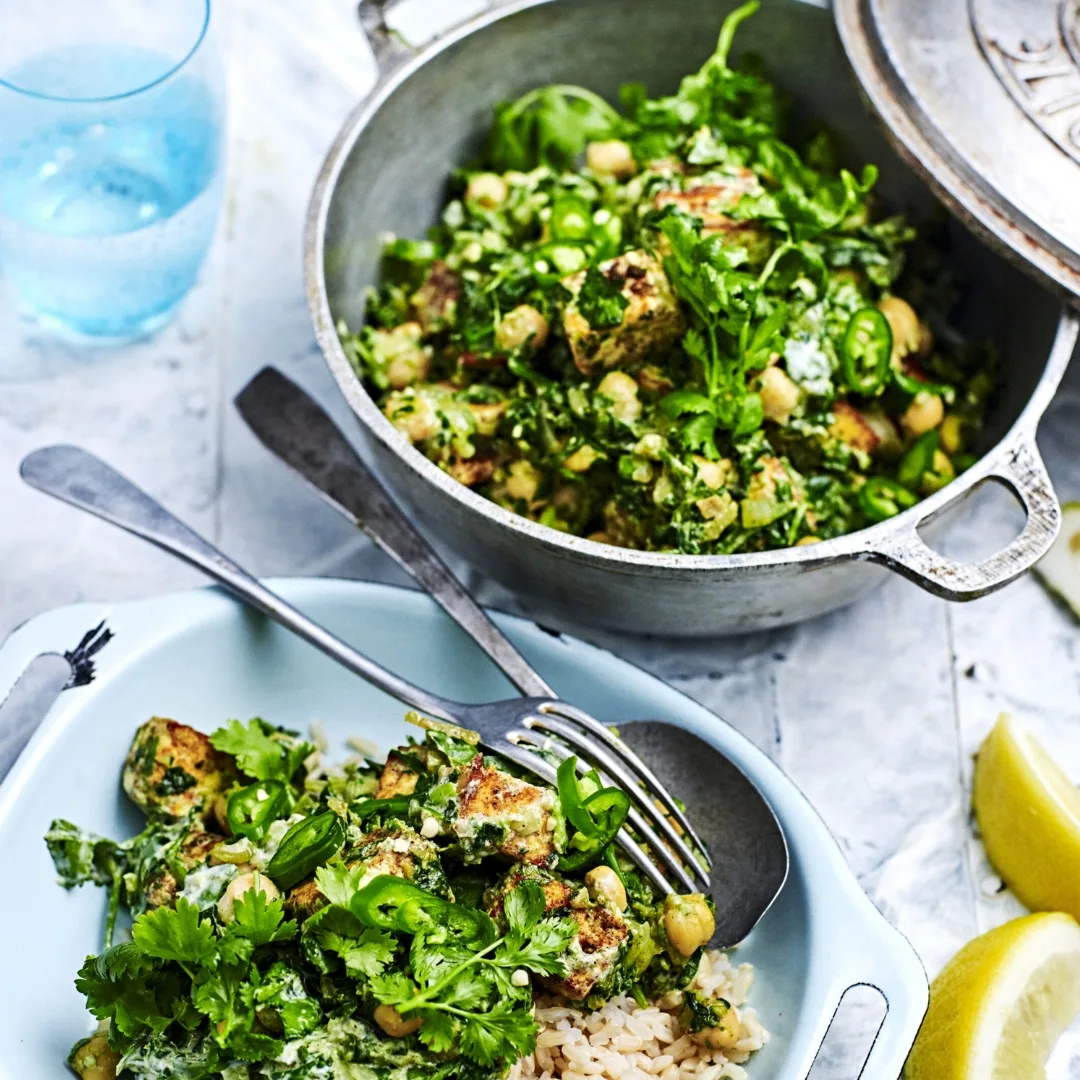 a bowl of palak paneer curry