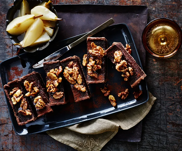 Rich dark chocolate tart with poached pears