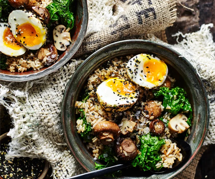 Brown rice and mushroom bowl with dukkah eggs