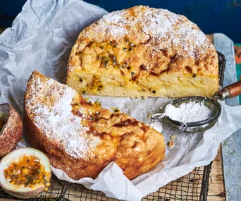 passionfruit cake cut in half and dusted with icing sugar; passionfruit cake recipes