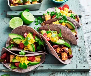 Paneer and bean tacos with creamed corn