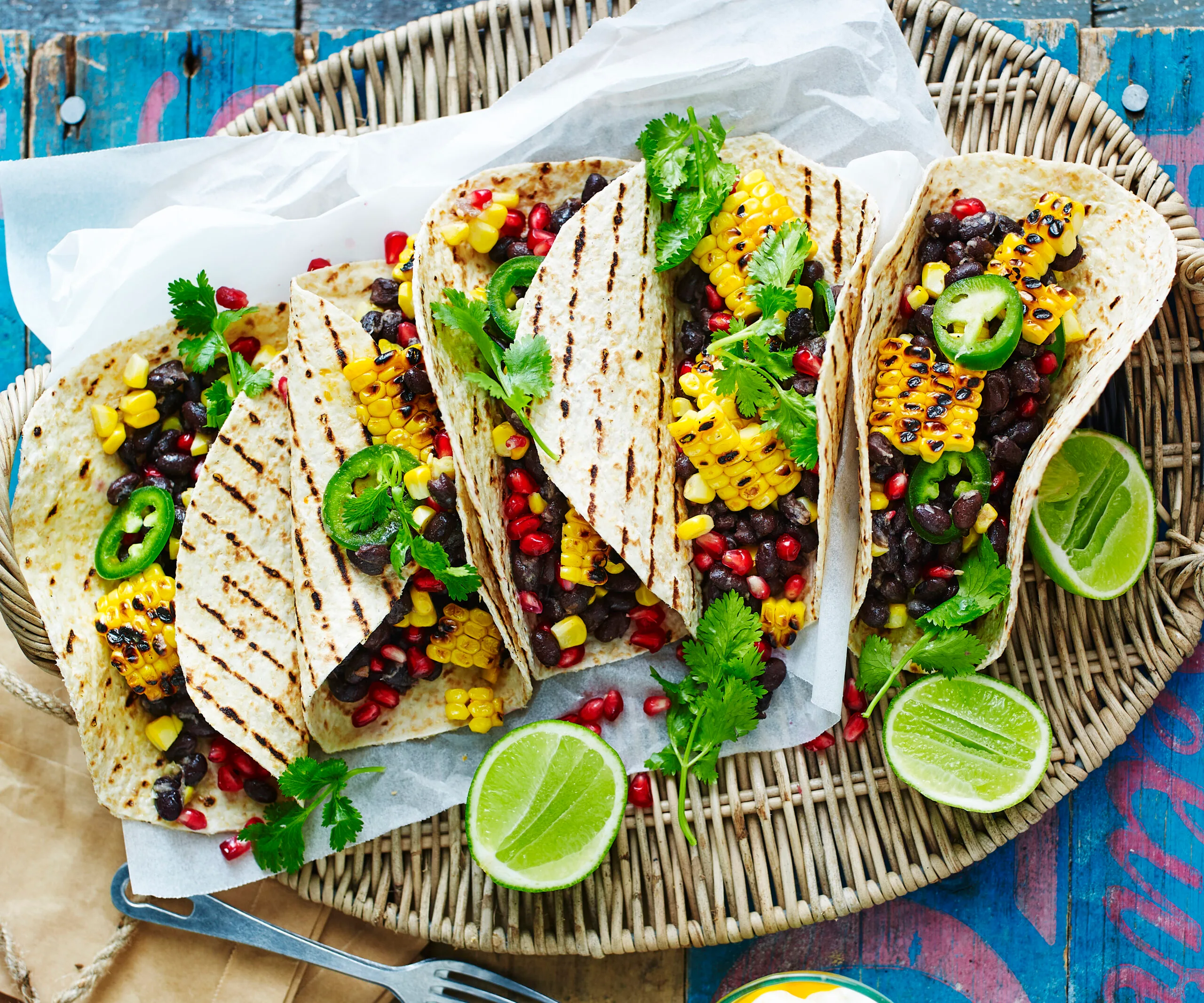 Harissa barbecued corn tortillas with black beans