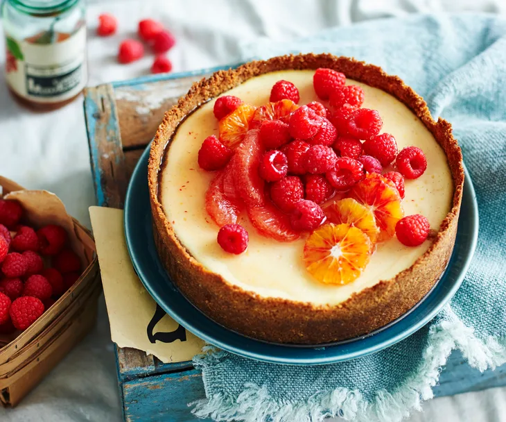 Orange labne cheesecake with ruby fruit salad