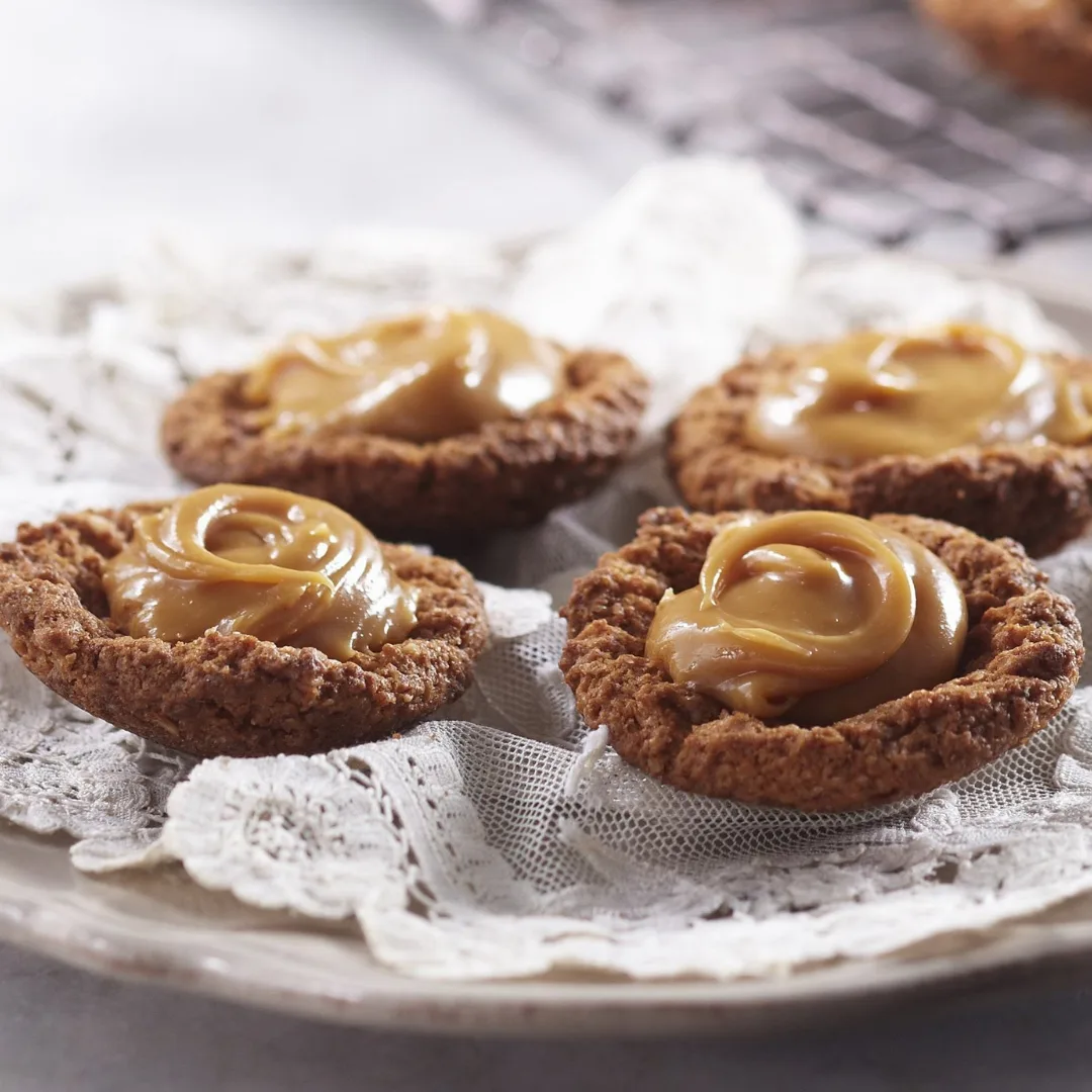 four easy caramel tarts on a plate