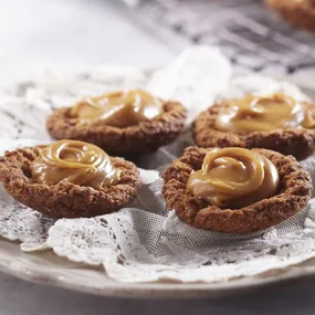 four easy caramel tarts on a plate