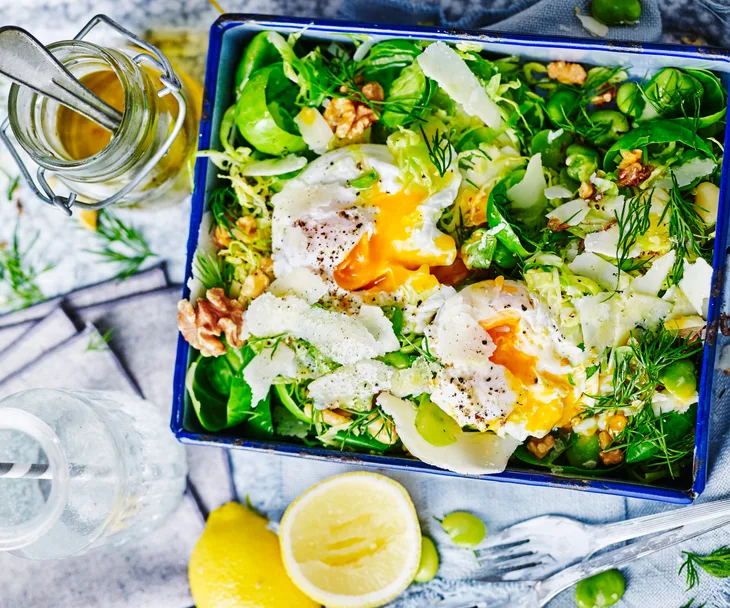 Broad bean and brussels sprout salad with poached eggs