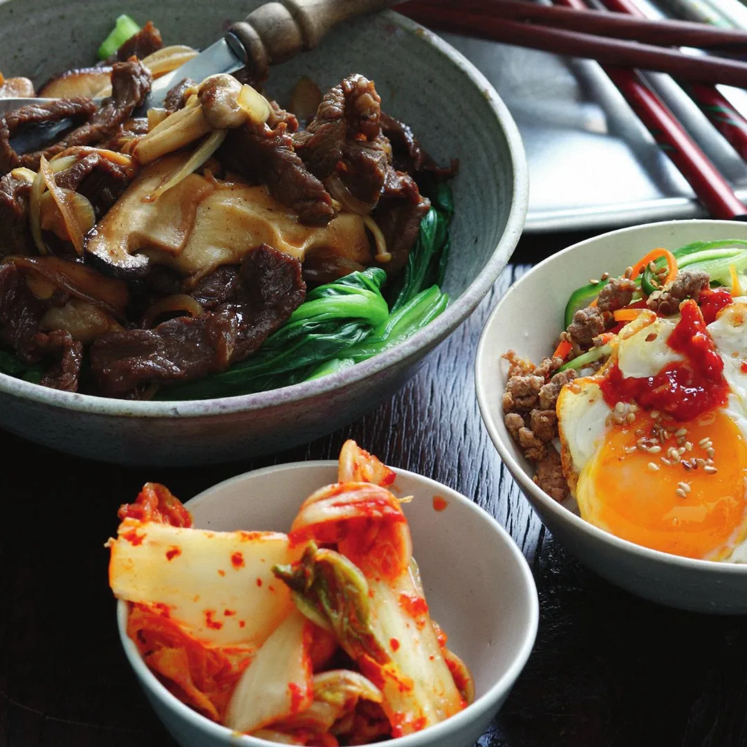 bulgogi recipe with a bowl of kimchi