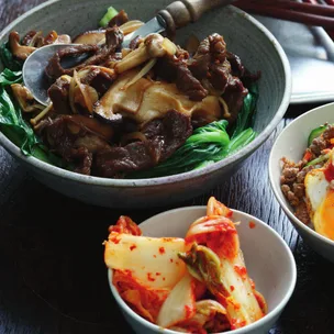 bulgogi recipe with a bowl of kimchi