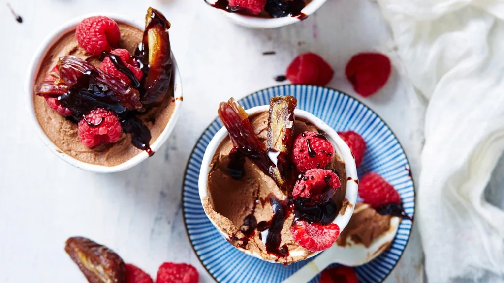 chocolate mousse (quick recipe) topped with raspberries and dates