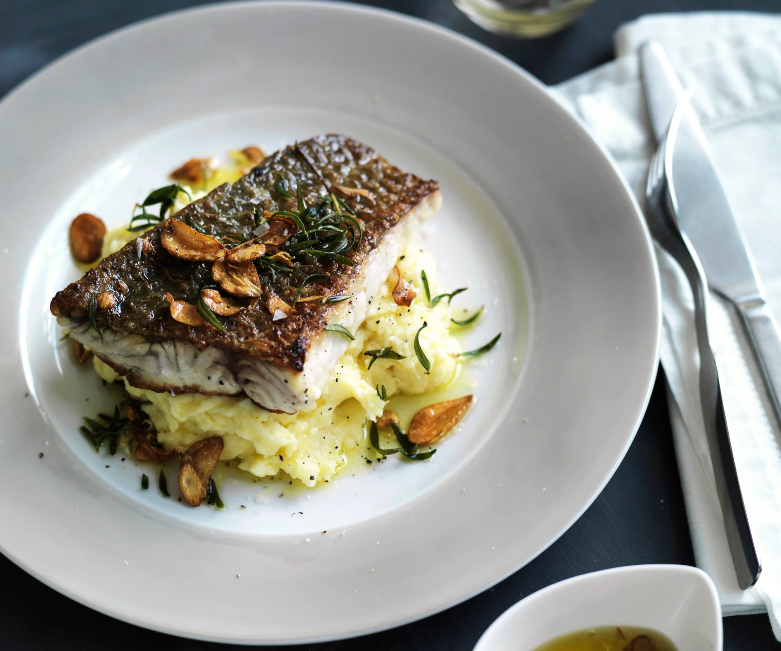crisp-skinned fish with roast garlic skordalia