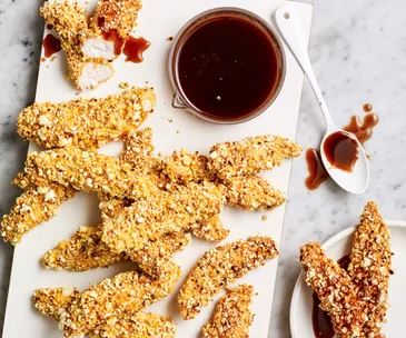 Air fryer popcorn-coated chicken with honey bbq sauce