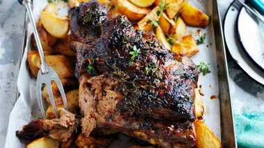 Greek roast lamb dinner with skordalia and lemony potatoes.