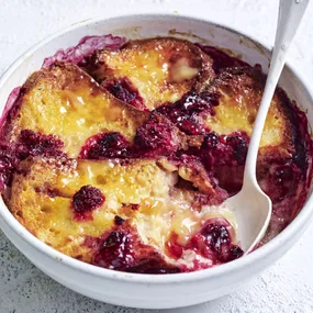 air fryer bread and butter pudding with raspberries and lemon curd