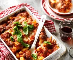 baked gnocchi and meatballs in a baking tray