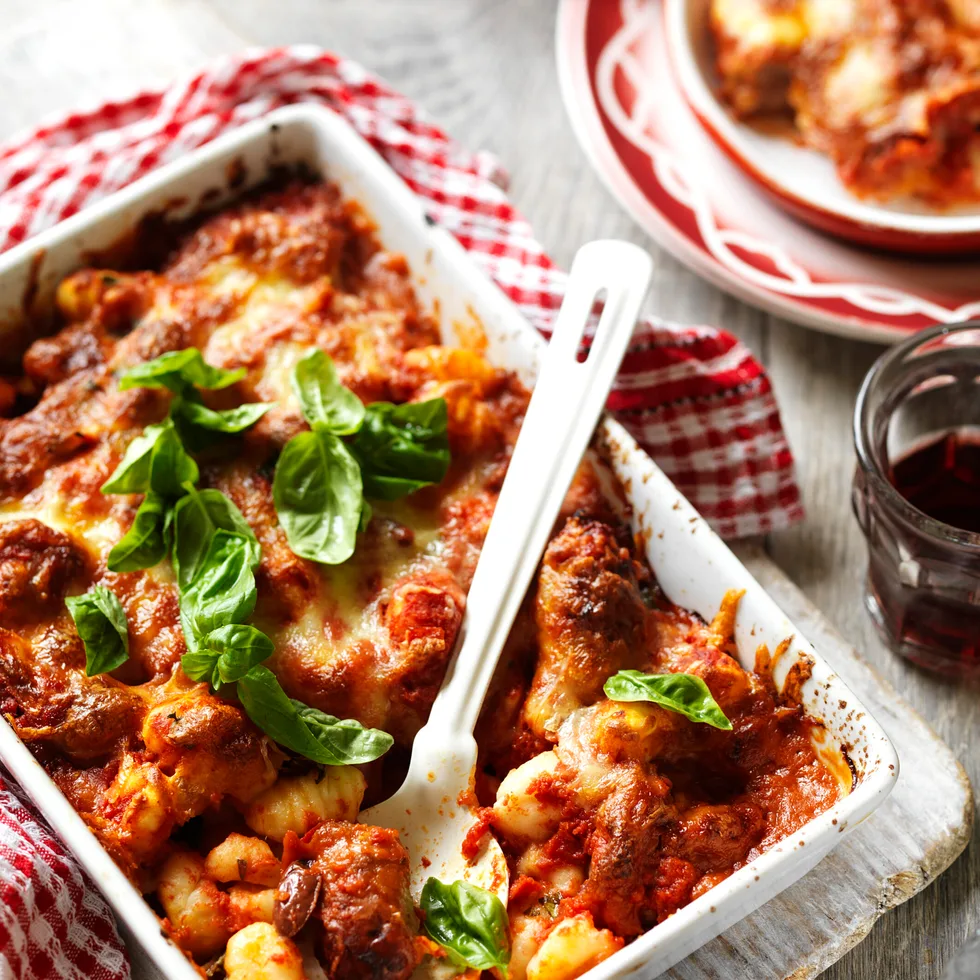 baked gnocchi and meatballs in a baking tray