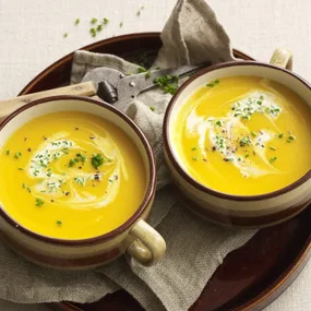 two bowls of slow cooker soup pumpkin