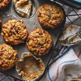 overnight date and muesli breakfast muffins in a muffin tray