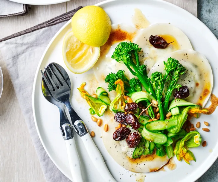 Goat&rsquo;s cheese ravioli with broccolini, pine nuts & muscatels