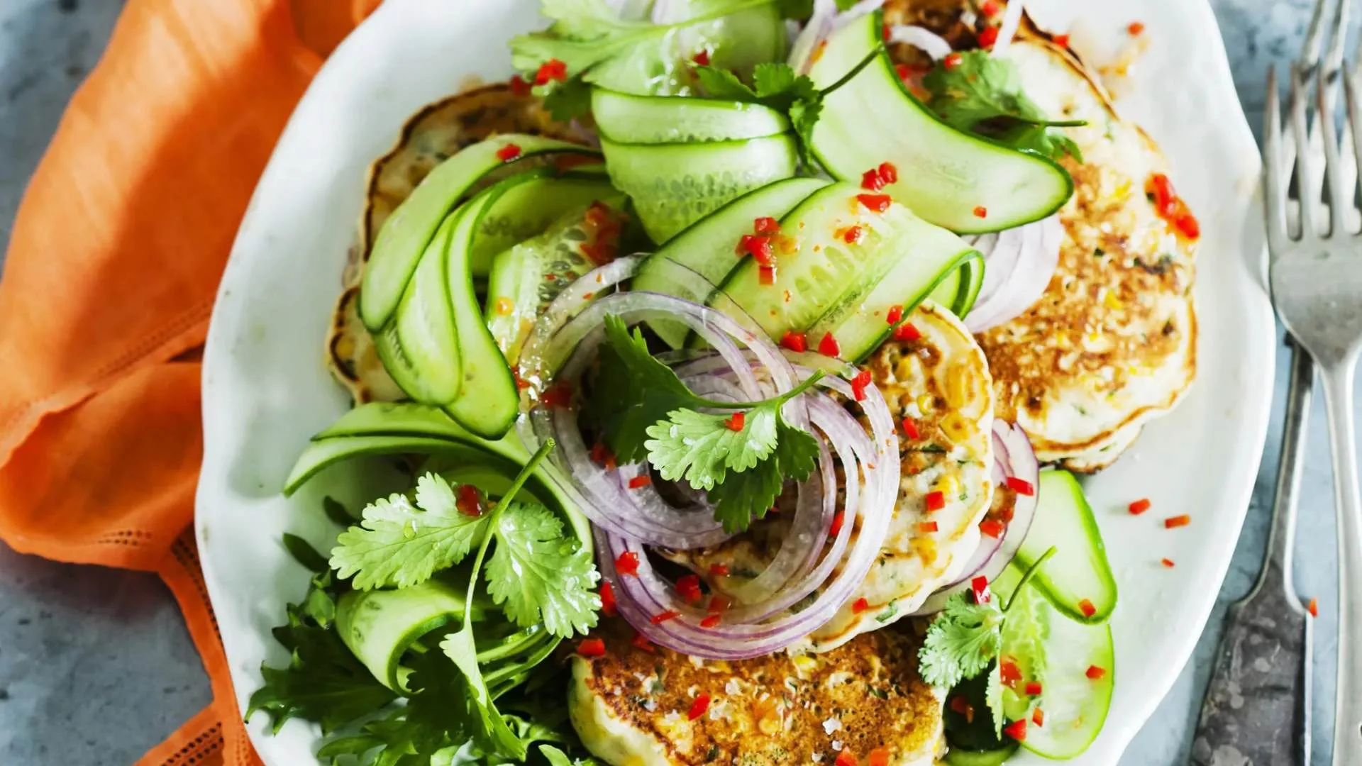 Corn fritters with cucumber salad recipe