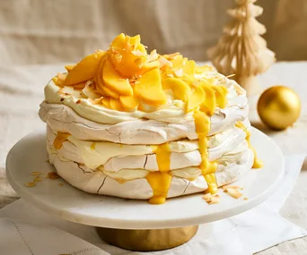 Calypso pavlova with mango curd.