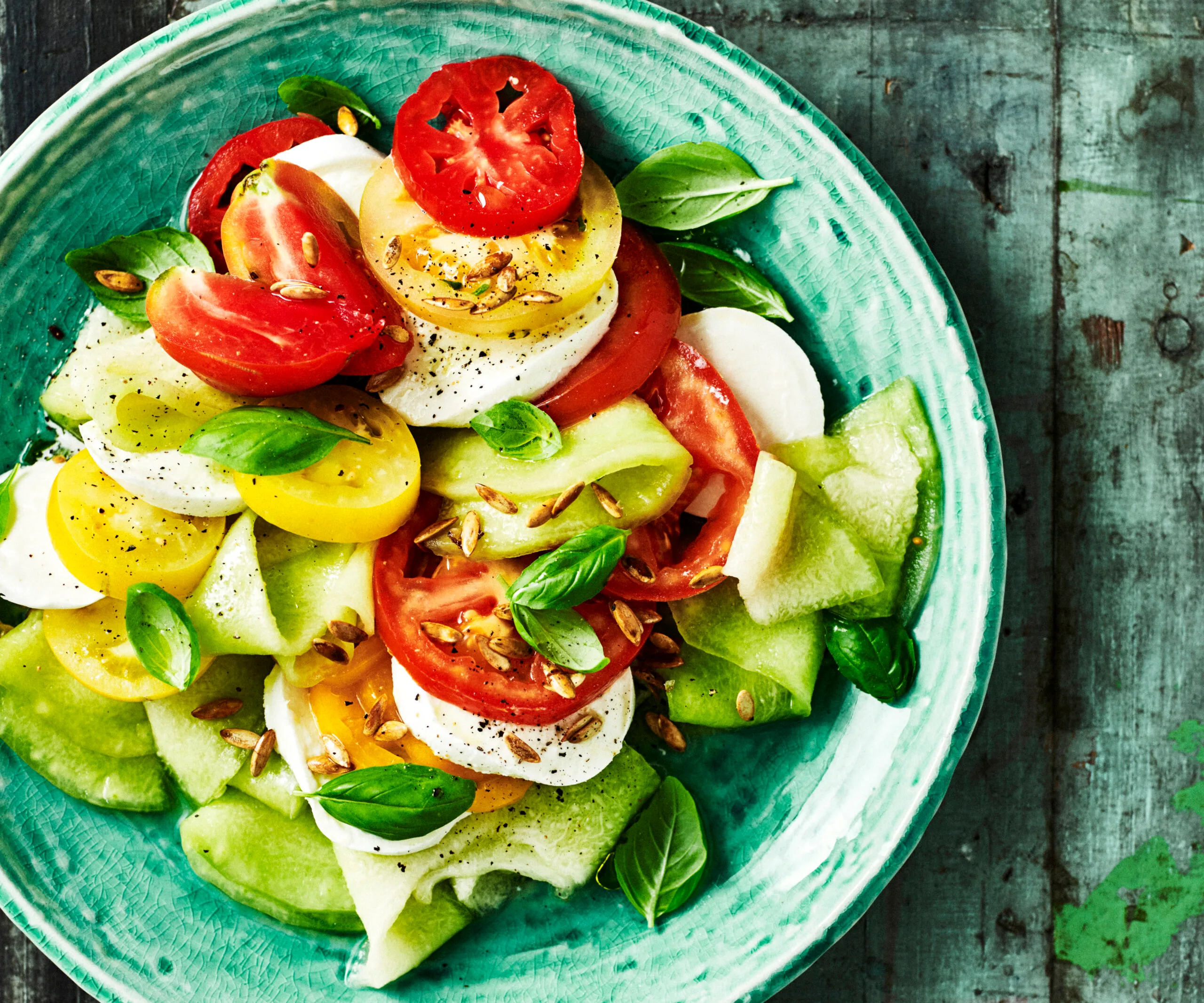 Mozzarella with heirloom tomatoes and pickled melon