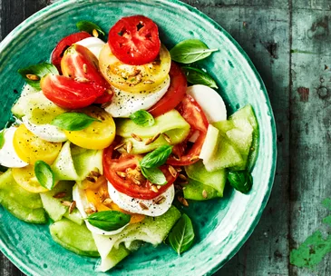 Mozzarella with heirloom tomatoes and pickled melon