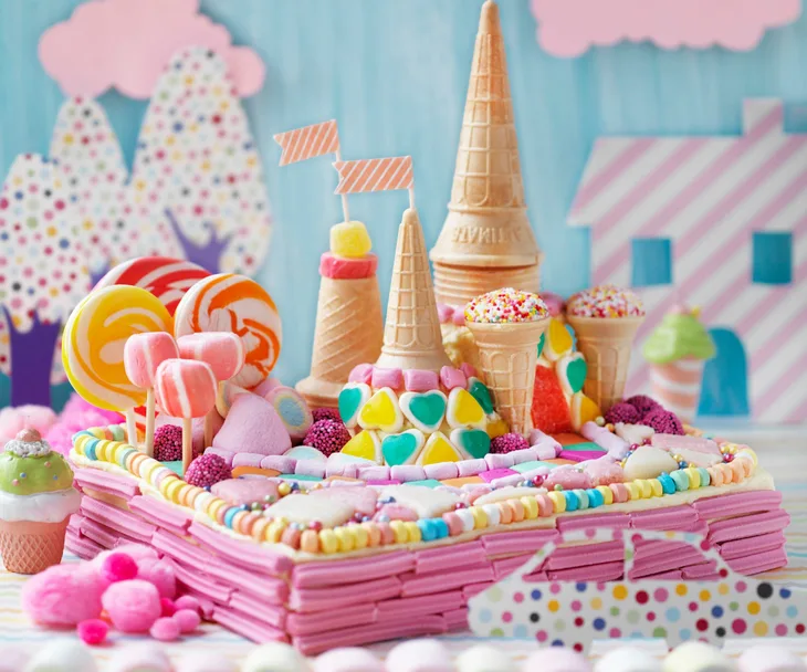 A slab cake decorated like a castle