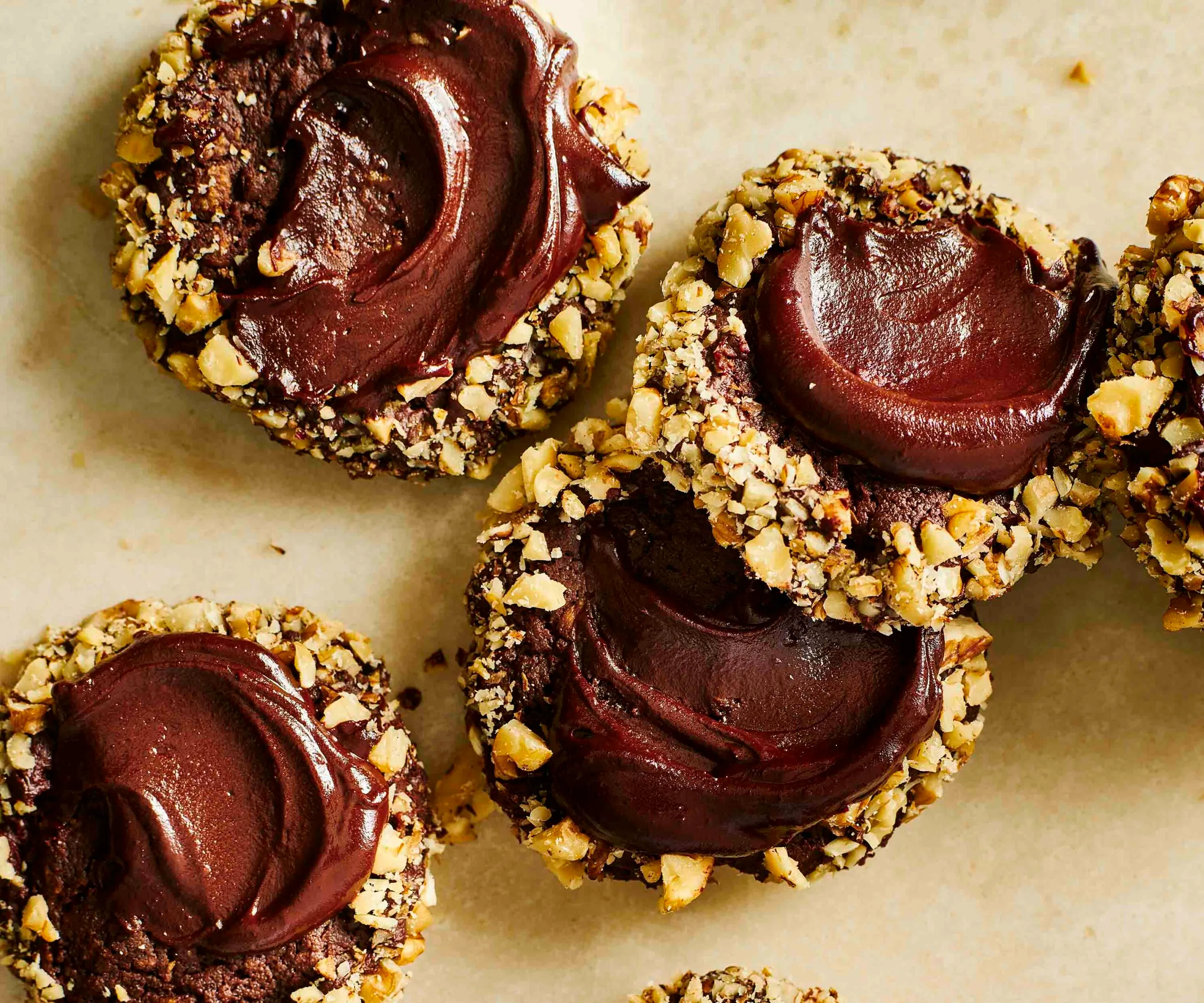 Chocolate cornflake ganache biscuits rolled in nuts