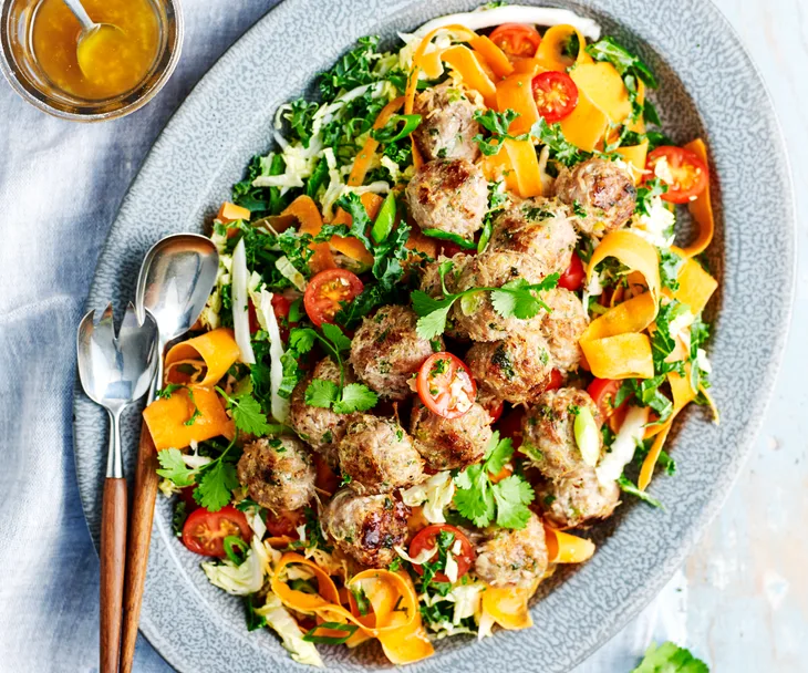 Platter of pork noodle balls with Asian salad