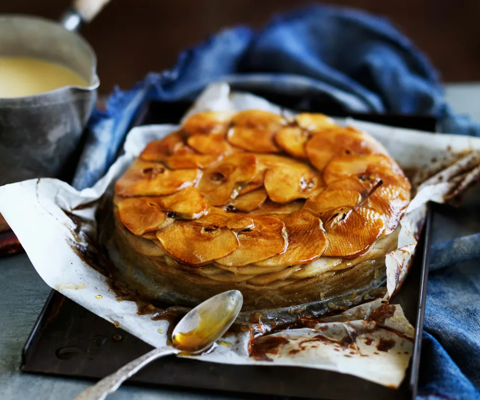 baked apple slices arranged into a cake shape