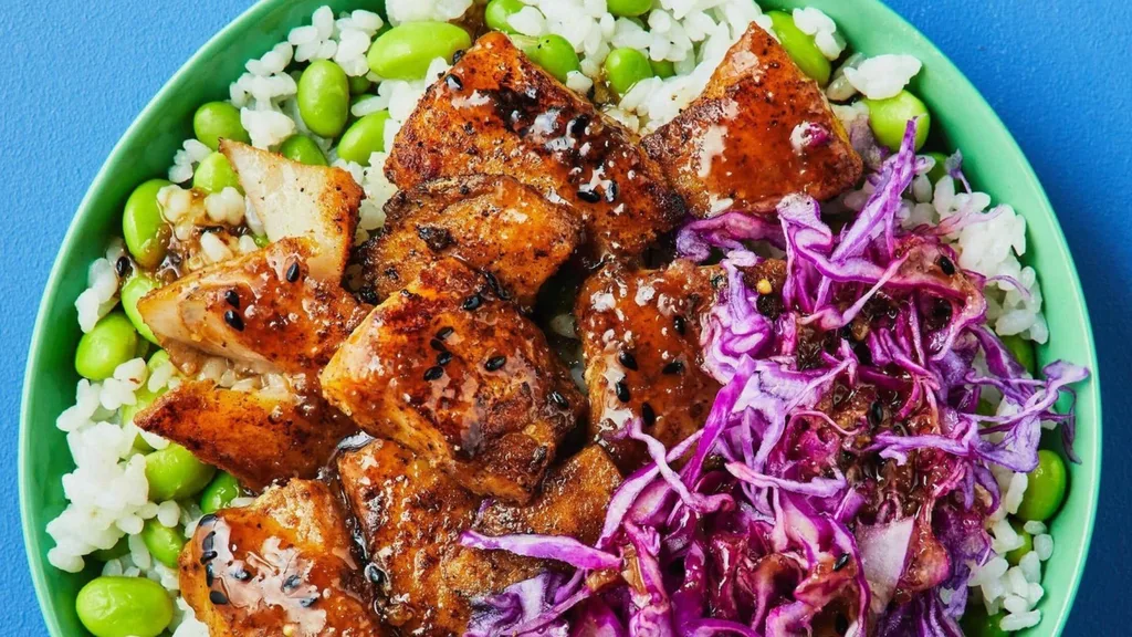 Basa Rice Bowl from Dinnerly, sat against blue background
