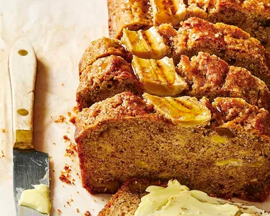 Banana bread sliced on a board