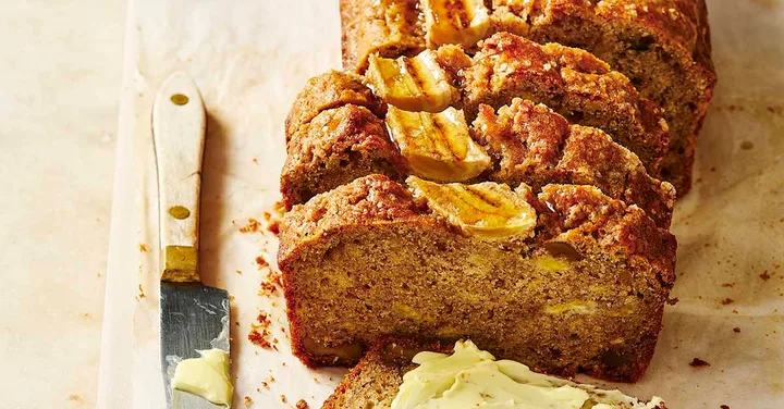 Banana bread sliced on a board