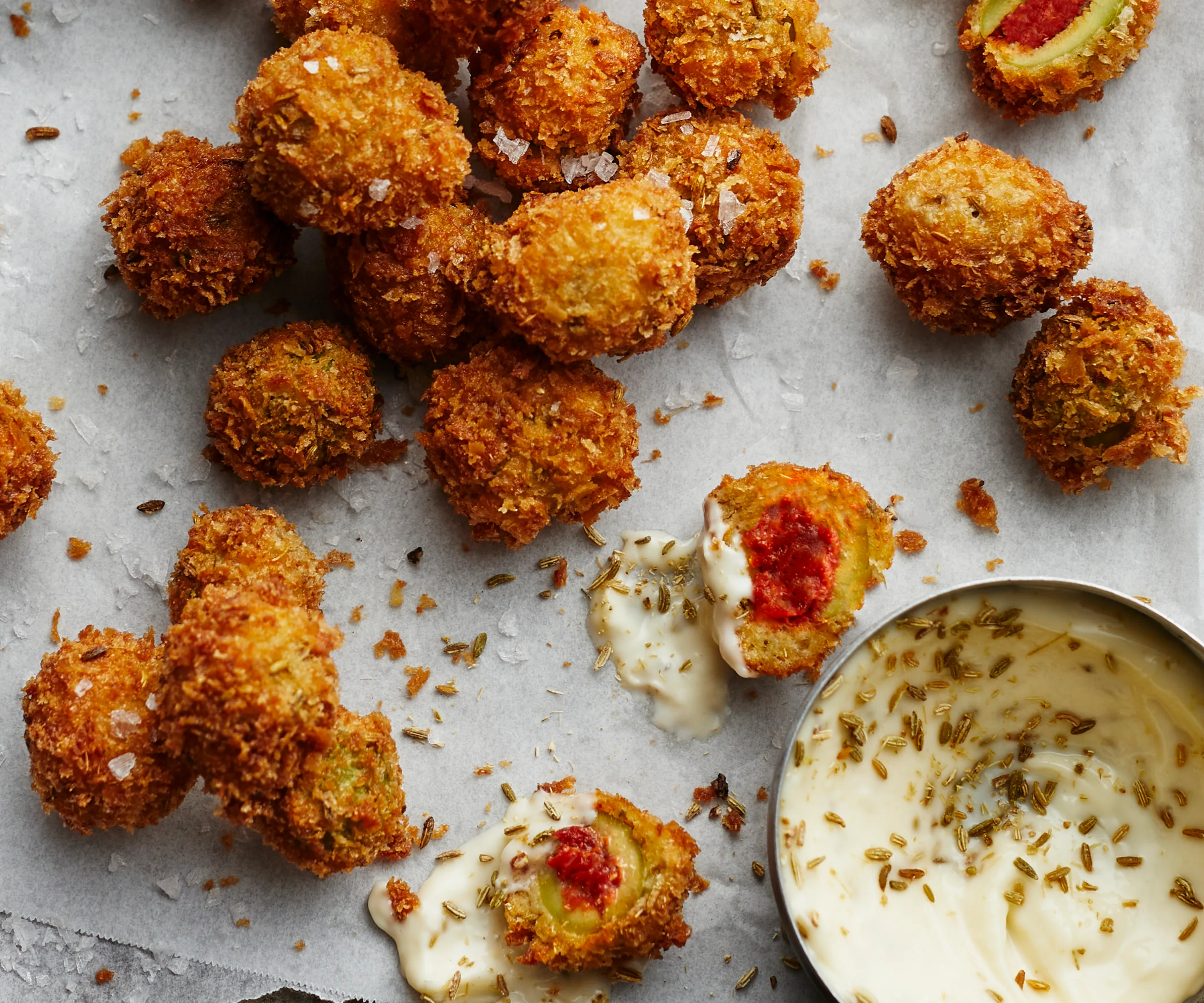 Fried harissa-stuffed green olives
