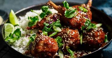 Five spice chicken drumsticks served with rice