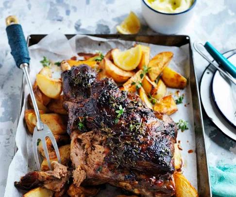 Slow cooked lamb with skordalia and lemony potatoes