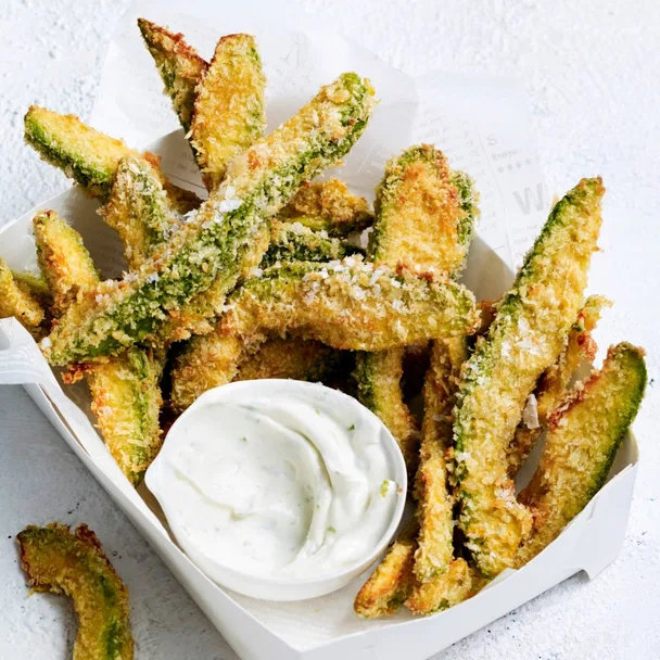 avocado fries with a container of white dipping sauce
