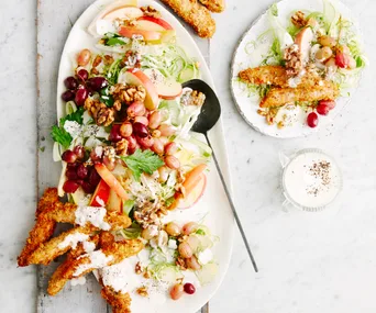 Brussels sprouts Waldorf salad with schnitzel fingers